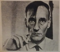 William Burroughs looking mysterious in shadow